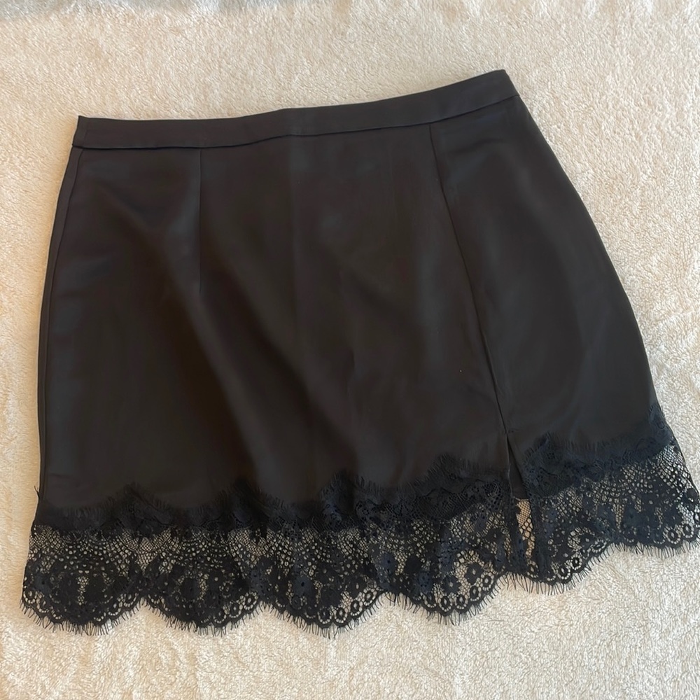 Black satin mini skirt with lace hem